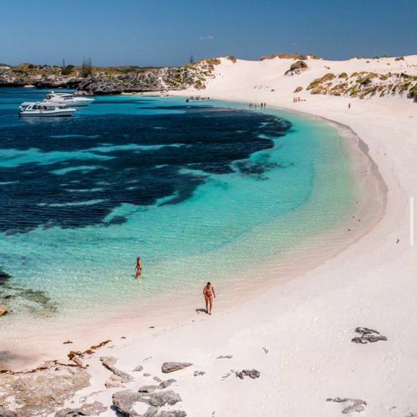 two people on a beach in Rottnest